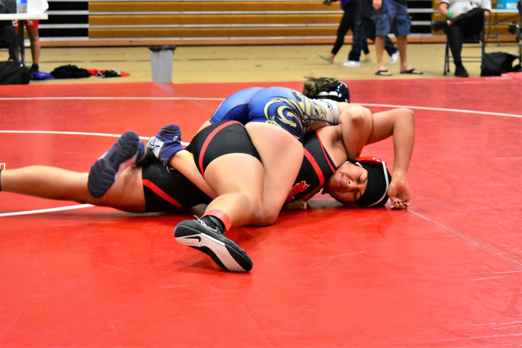 Santa Maria's Jessica Ramirez tries to escape from Golden Valley's Audrey Chavez
